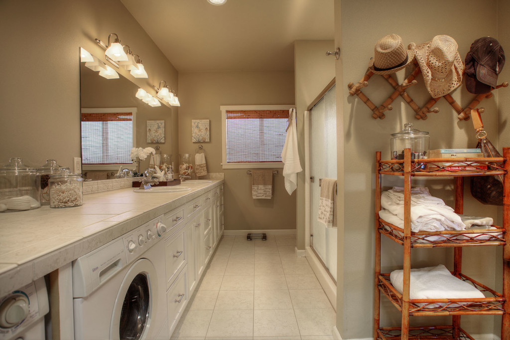 master bathroom with laundry room